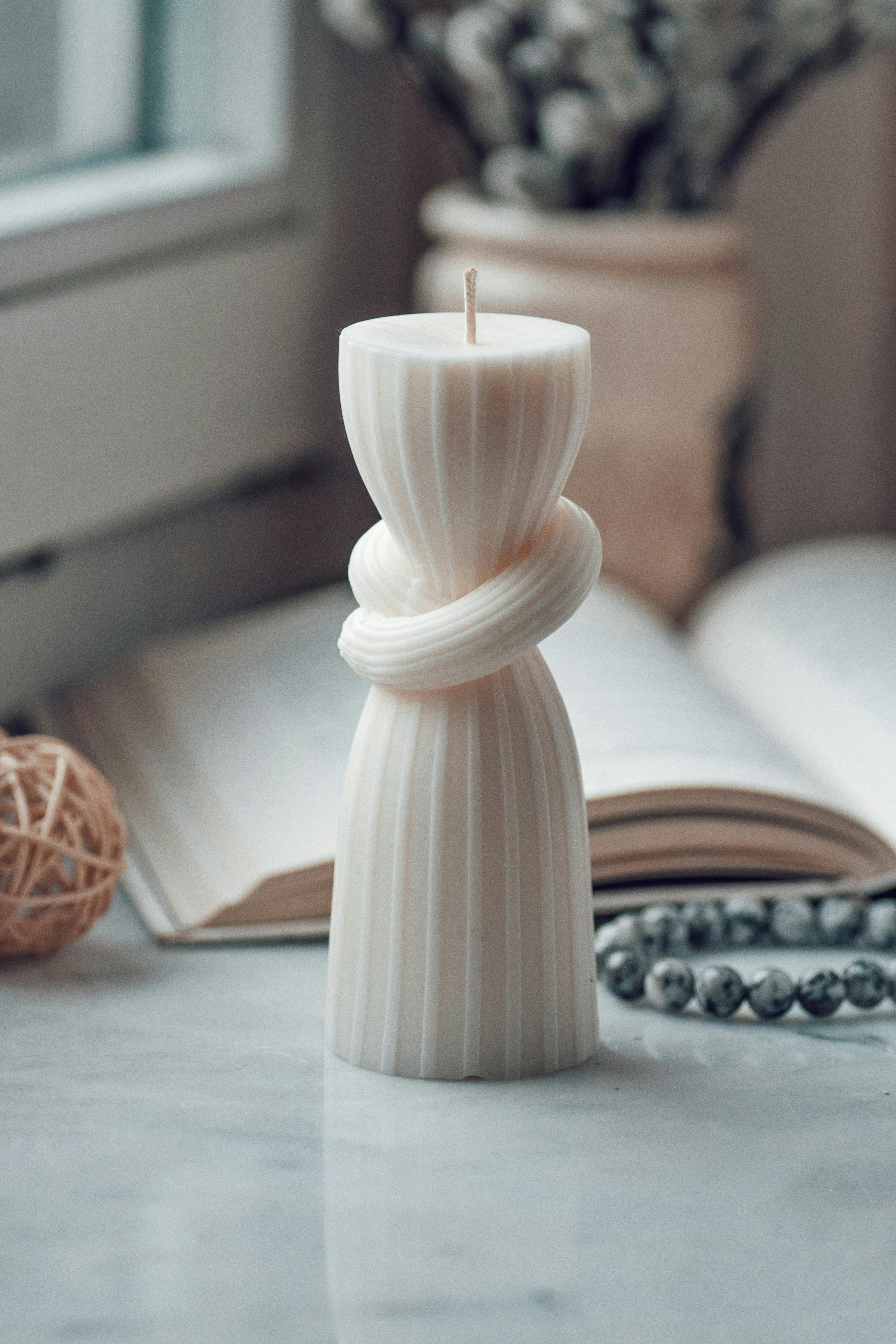 Ceramic storage jar in a warm neutral setting